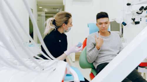 A doctor speaking to a patient