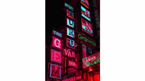 A building with neon signs