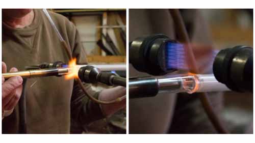 Heating a neon glass tube eliminates impurities