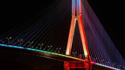 Multicolor neon light decor on a bridge